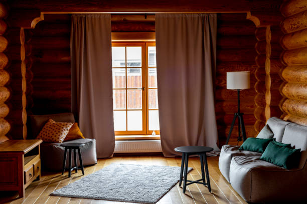 istock Wooden house interior - cozy room in sunlight 1254019211