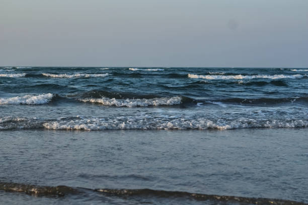 istock a beautiful tropical sea beach view with cloudy sky 1254025297