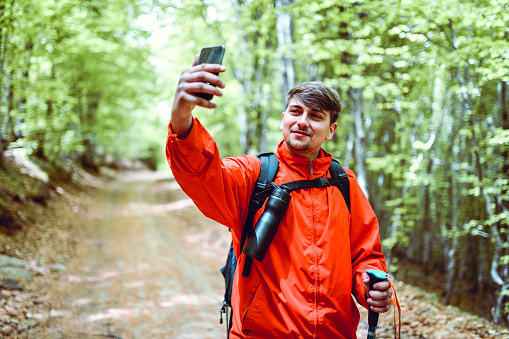 Selfie By Young Hiker In Forest