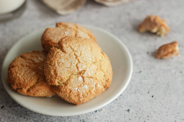 istock Tasty almond cookies with milk 1254030794