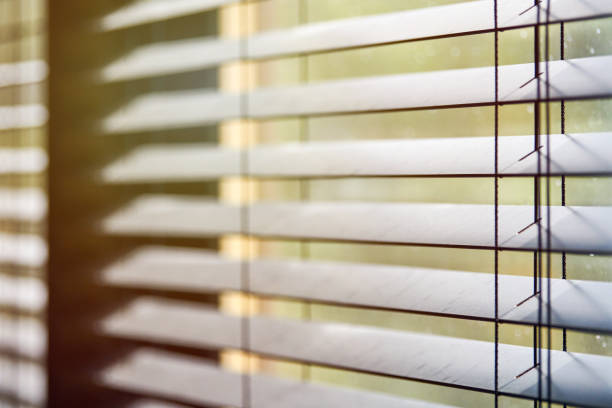 istock Office blinds. Modern wooden jalousie. Office meeting room lighting range control. 1254031947