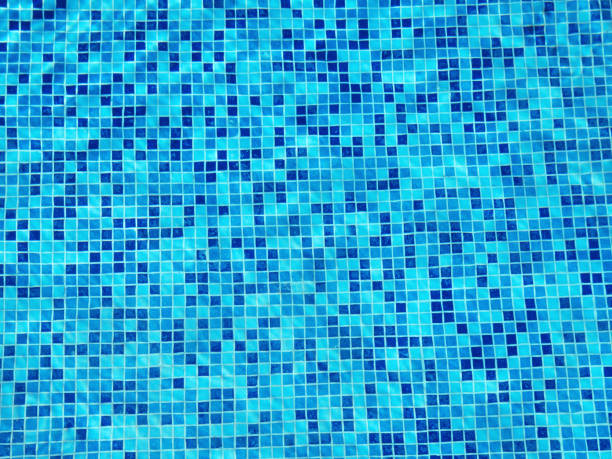 istock Surface of blue ripped water in swimming pool 1254035046