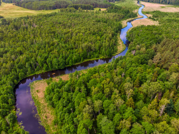 istock rural landscape with a small meandering river (aerial view) 1254037830
