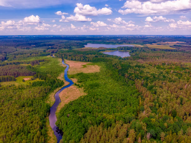 istock rural landscape with a small meandering river (aerial view) 1254037834