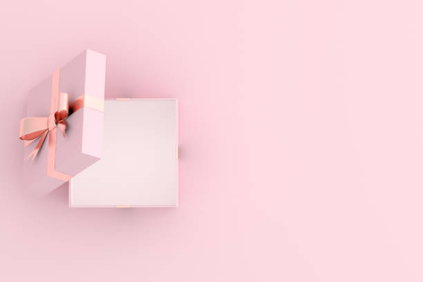 istock Mock up of open gift box on pink background. 3D rendering. 1254039325