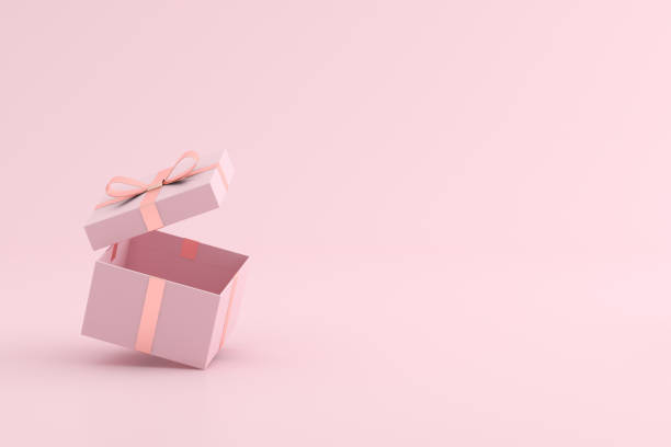 istock Mock up of open gift box on pink background. 3D rendering. 1254039332