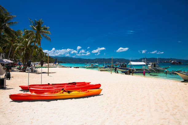 istock Diving's boat at famous White Beach on Boracay Island, Philippines. 1254041201