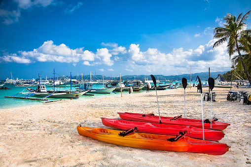 Canue for rental on shore at Bulabog beach. Boracay island. Philippines.