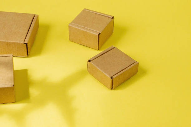 istock Shadow Airplane and stack of cardboard boxes. concept of air cargo and parcels, airmail. Fast delivery of goods and products. Cargo aircraft. Logistics, connection to hard-to-reach places. Banner, copy space 1254043595