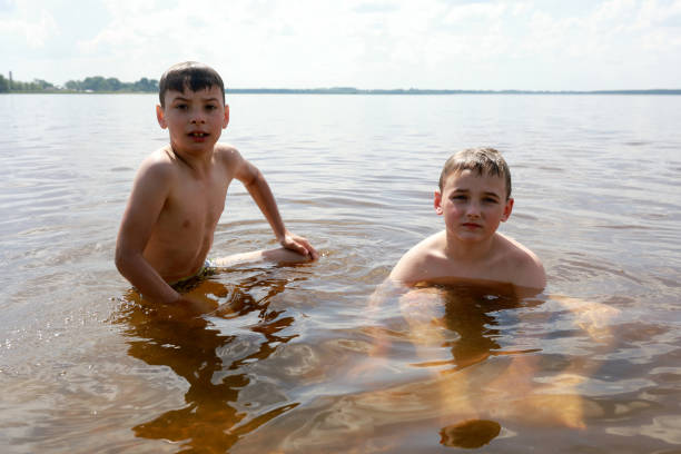 istock Children in Lake Seliger 1254047018