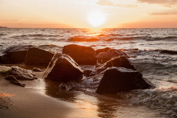 istock bright and warm sunset at sea without people 1254054581