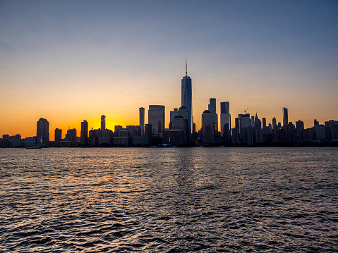 Lower Manhattan skyline, New York skyline at early morning sunrise,  seen from the Jersey shore.