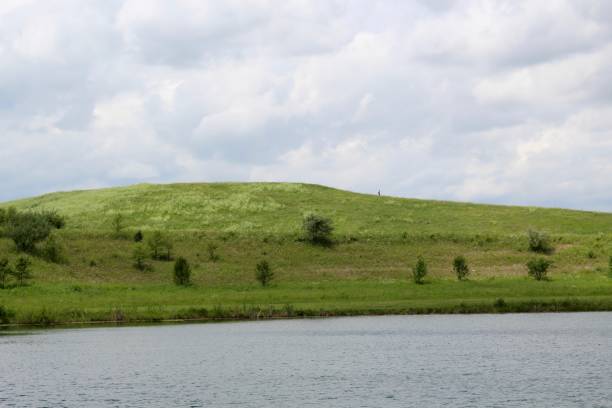 istock Hill Landscape and Calm Lake 1254059939