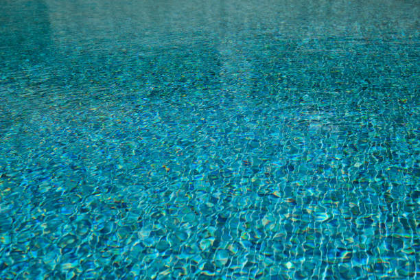 istock Water surface in the pool. Water is moving in the pool 1254059976