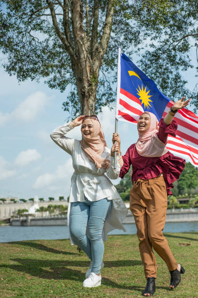 istock Malaysian women celebrating Independence Day 1254060062
