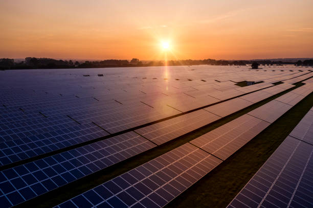 istock Sunrise over a modern solar farm 1254060111