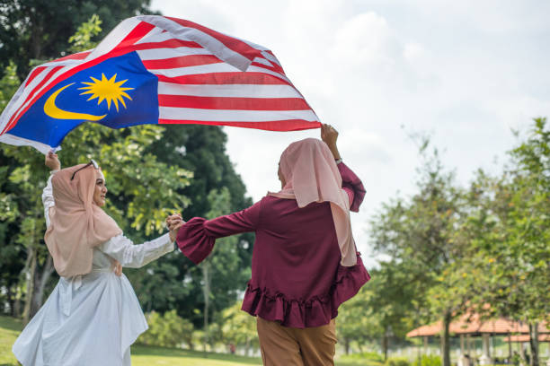 istock Malaysian women celebrating Independence Day 1254060501