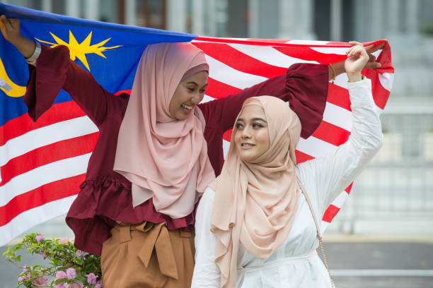 istock Malaysian women celebrating Independence Day 1254060797