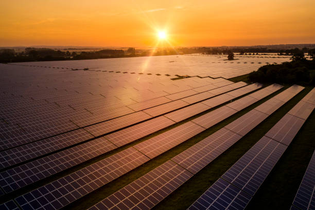 istock Sunrise over a modern solar farm 1254061857