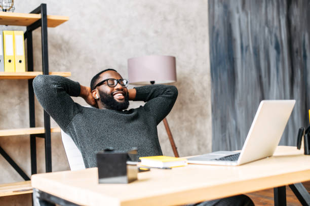 istock An African-American guy resting on the workplace 1254062263