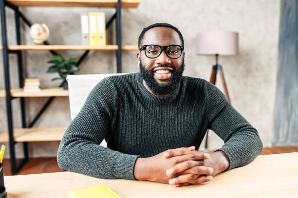 istock Webcam shot of African-American guy 1254062315