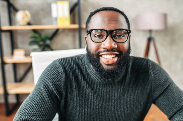 istock Webcam shot of African-American guy 1254062320