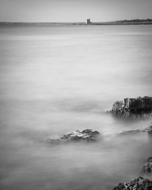 istock Salento seascape rocks long exposure sunset 1254065120