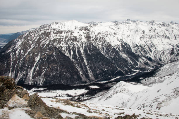 istock Mountain landscape of snowy Dombay 1254065150