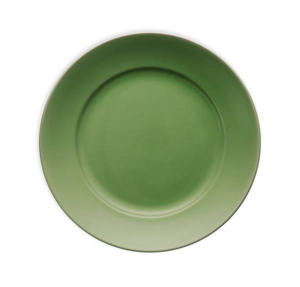 Empty ceramics plates, Classic dark green plate isolated on white background with clipping path, Top view