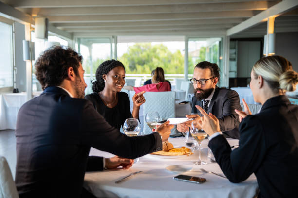 istock Business people dining in a luxury restaurant 1254067789