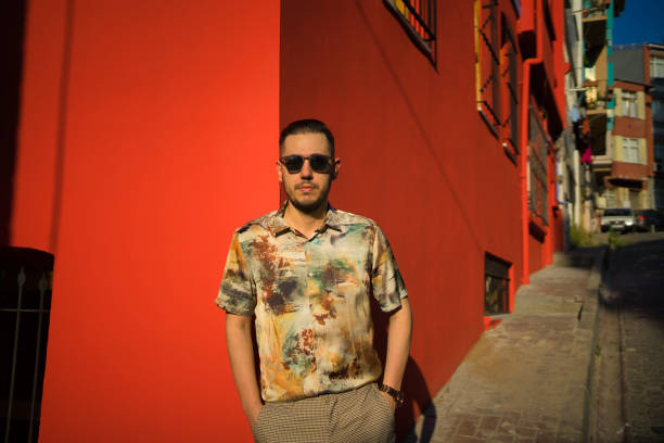 istock man portrait in front house 1254069556