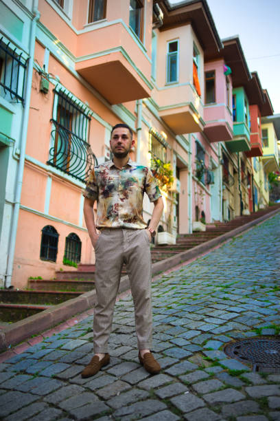 istock man portrait in front house 1254070196