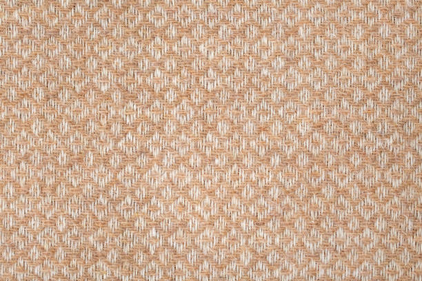 istock Brown and white geometric woolen fabric background 1254071359