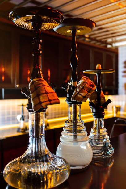 Hookahs stand in a row at the bar
