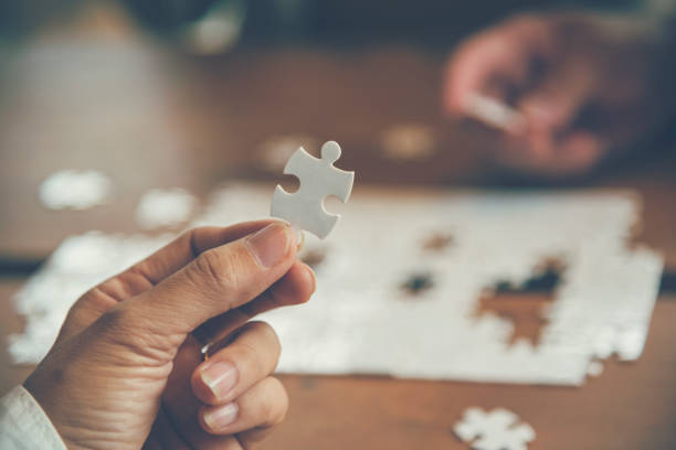 implement improve puzzel solve connections together with synergy strategy team building organizing connection by trust communication. hands of stakeholders business trust team holding jigsaw puzzle - jigsaw puzzle solution one person people imagens e fotografias de stock