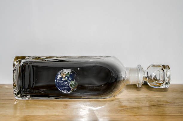 istock Earth and moon in a bottle 1254075862