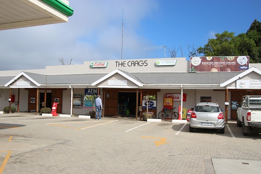 The Crags, South Africa - March 2, 2020: Supermarket and petrol station in the countryside. Near Plettenberg Bay, Garden Route, South Africa, Africa.