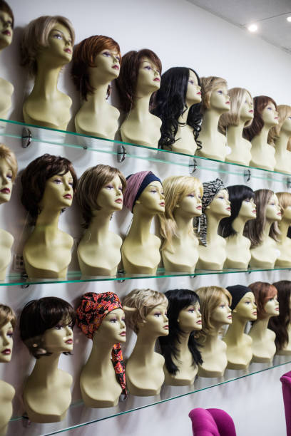 istock Rows of hair wigs 1254077710