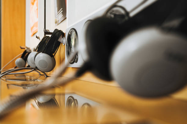 istock vintage headphones on a rustic or bare wooden table wall 1254078009