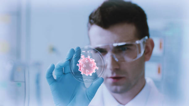 istock Coronavirus research. COVID-19 tests using augmented reality petri dish 1254080273