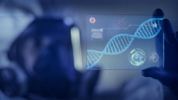istock Scientist in clean suit studying DNA mutations. Virtual touch screens. Covid-19 complications 1254080550