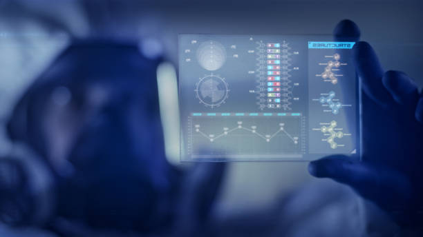 istock Scientist in clean suit studying DNA mutations. Virtual touch screens. Covid-19 complications 1254080573