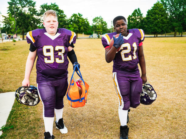 istock Junior Football players getting ready 1254080643