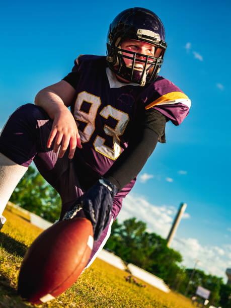 istock Junior Football player during game 1254081779