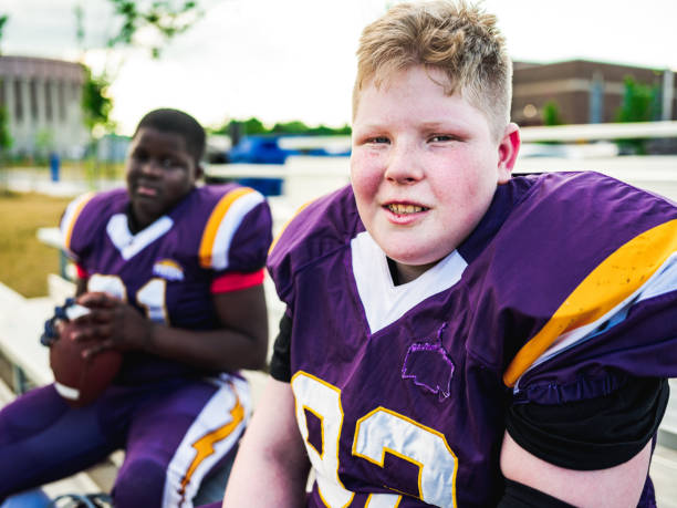 istock Junior Football players getting ready 1254081839