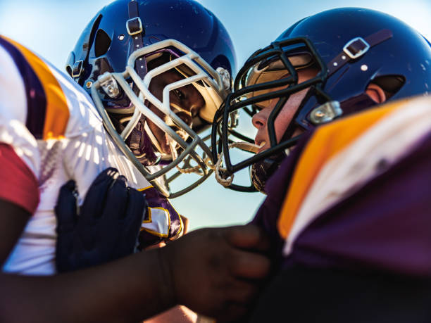 istock Junior Football players during game 1254082729