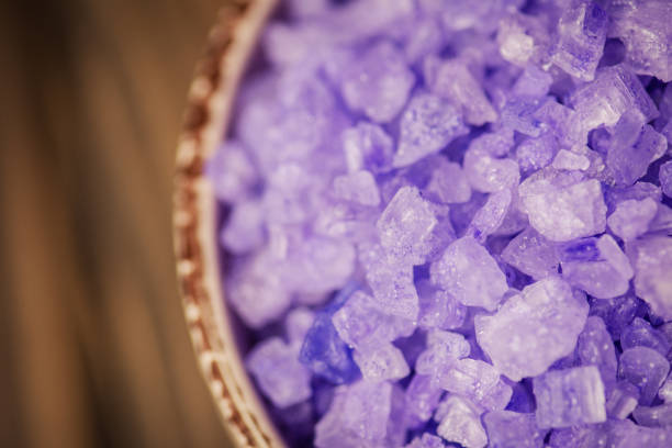 Lavender aromatic sea salt.Spa violet salt. Sea salt crystals. Bowl with sea salt