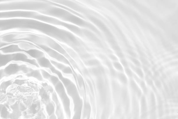 istock desaturated transparent clear calm water surface texture 1254084167