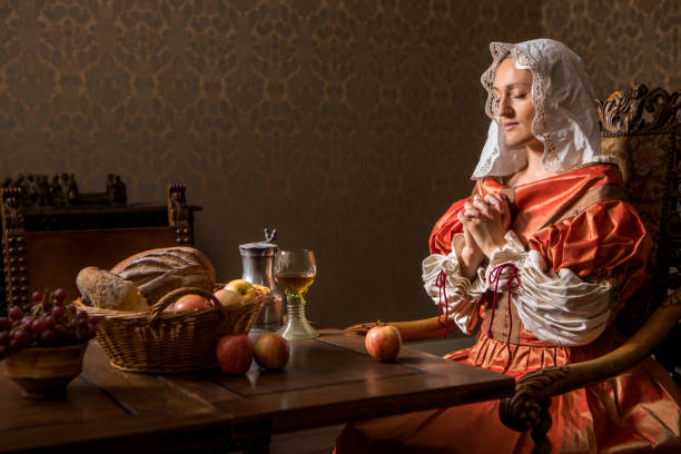 Portrait of a beautiful historical dutch noble woman Portrait of a beautiful historical dutch noble woman wearing historically correct outfit in a typical townhouse drawing room scene dutch baroque architecture stock pictures, royalty-free photos & images