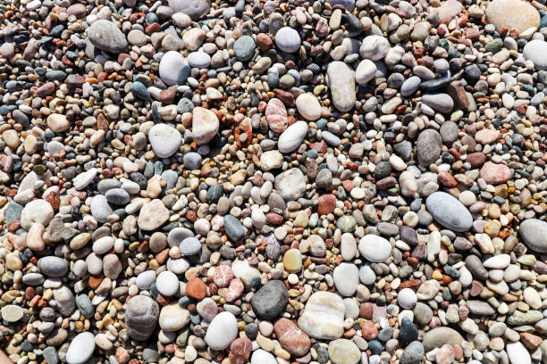 istock Small stones of different colors texture. 1254098889